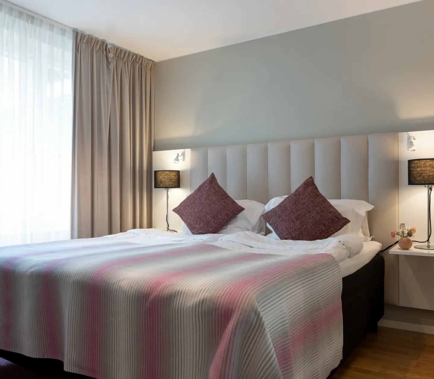 Double bed with bedside lamps on each side