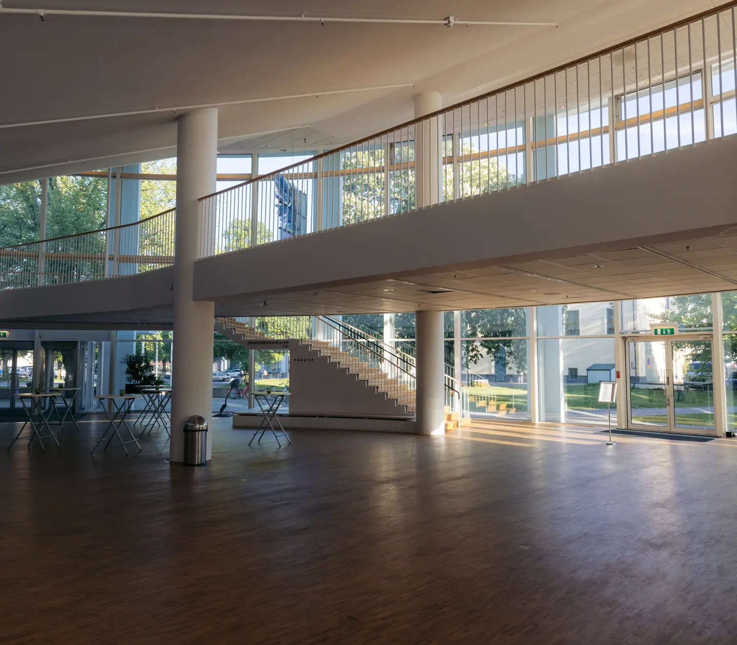 Bright lobby with large windows and lounge chairs