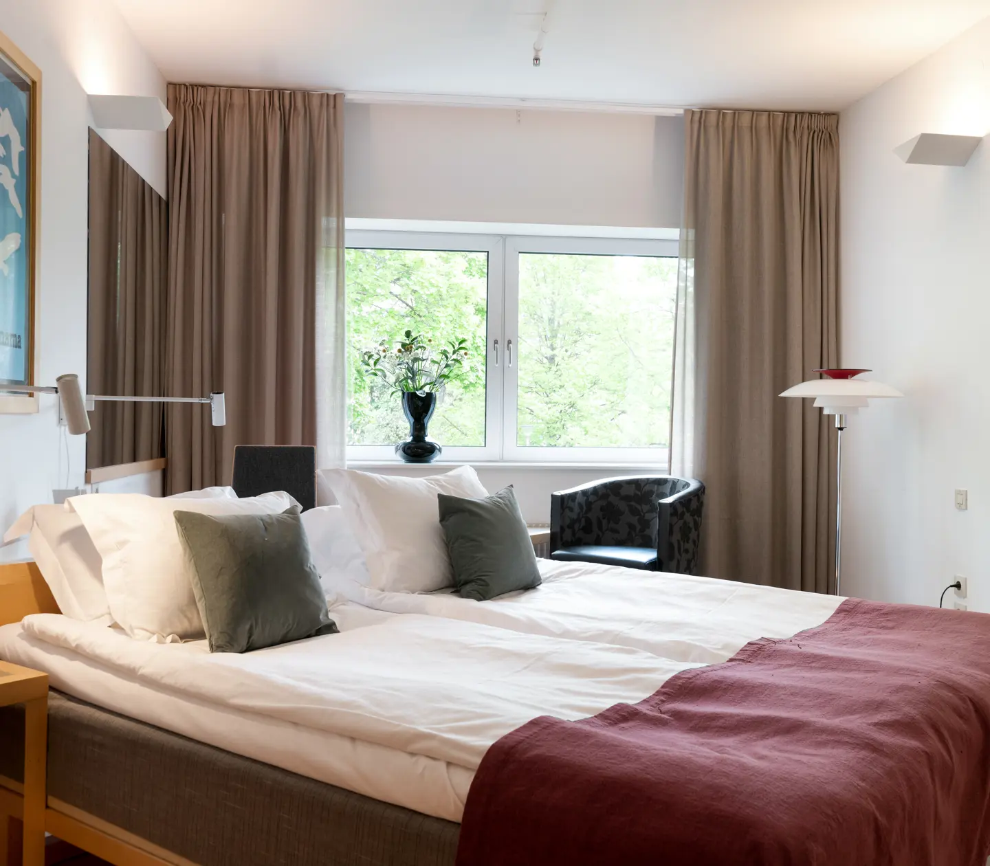 Cozy hotel room with double bed and window