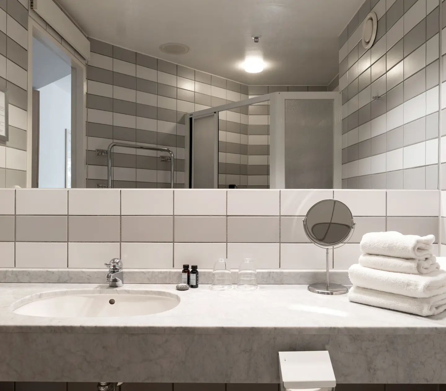 Bathroom with sink and mirror