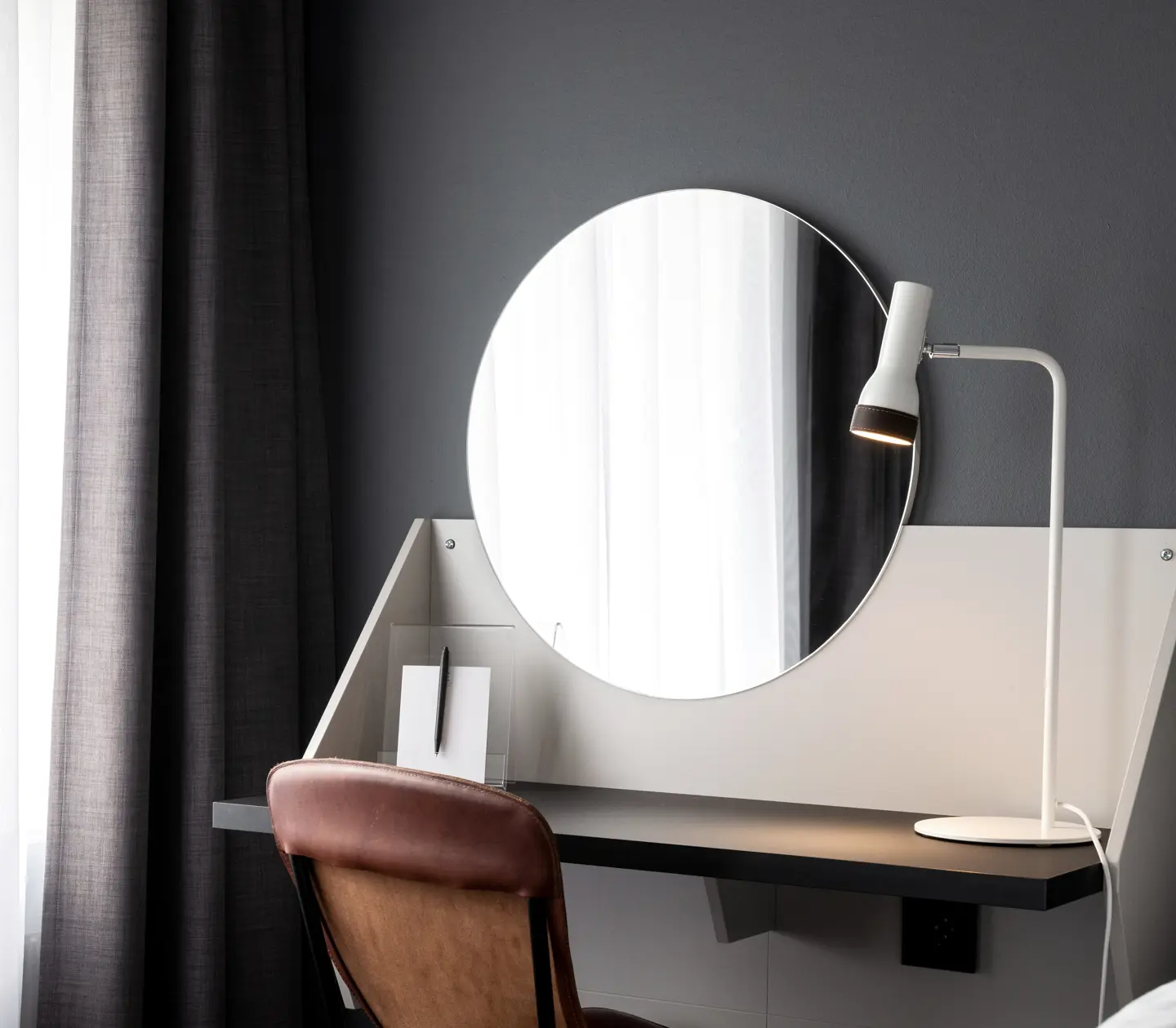 Desk with round mirror