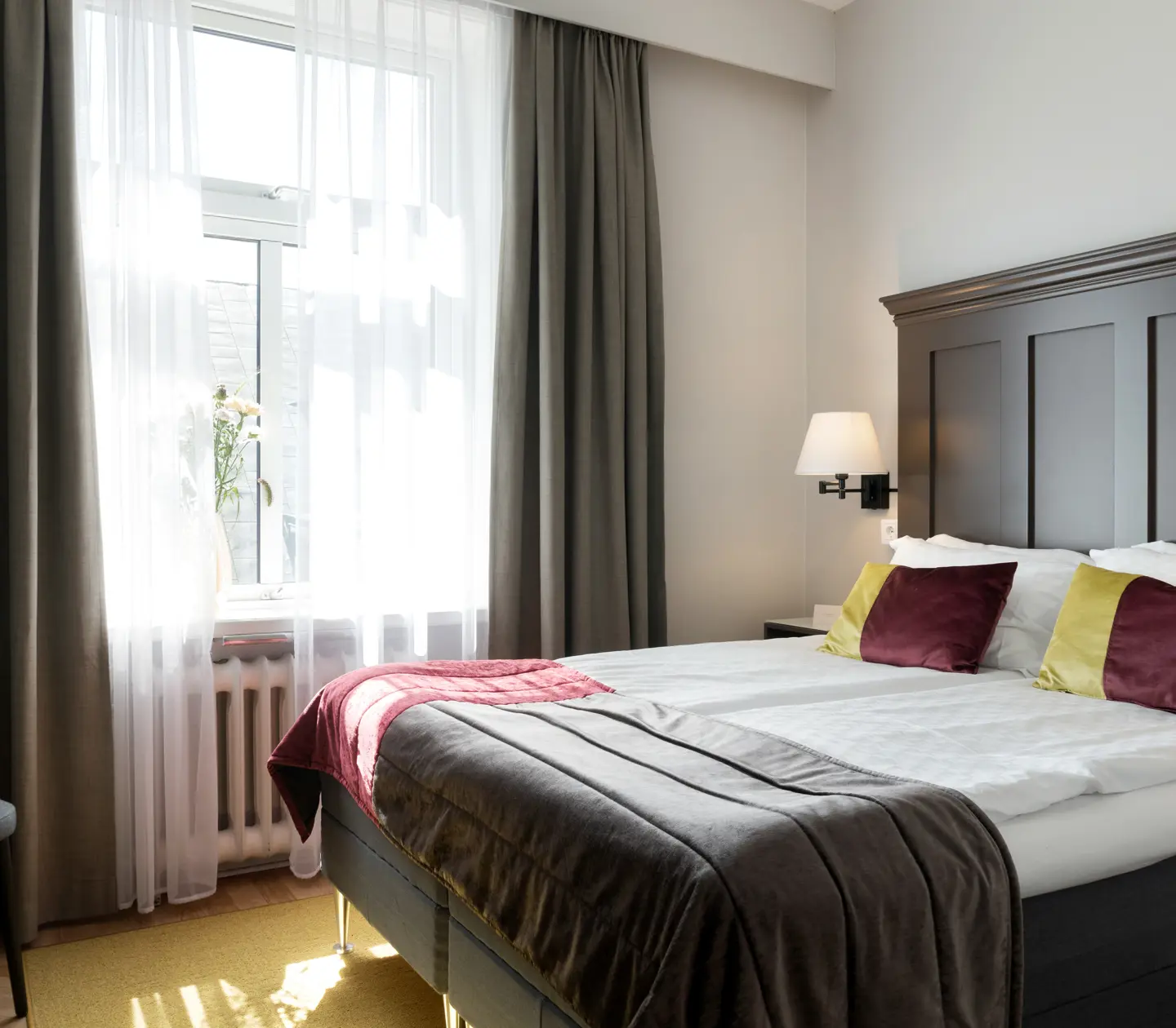 Hotel room with double bed and window