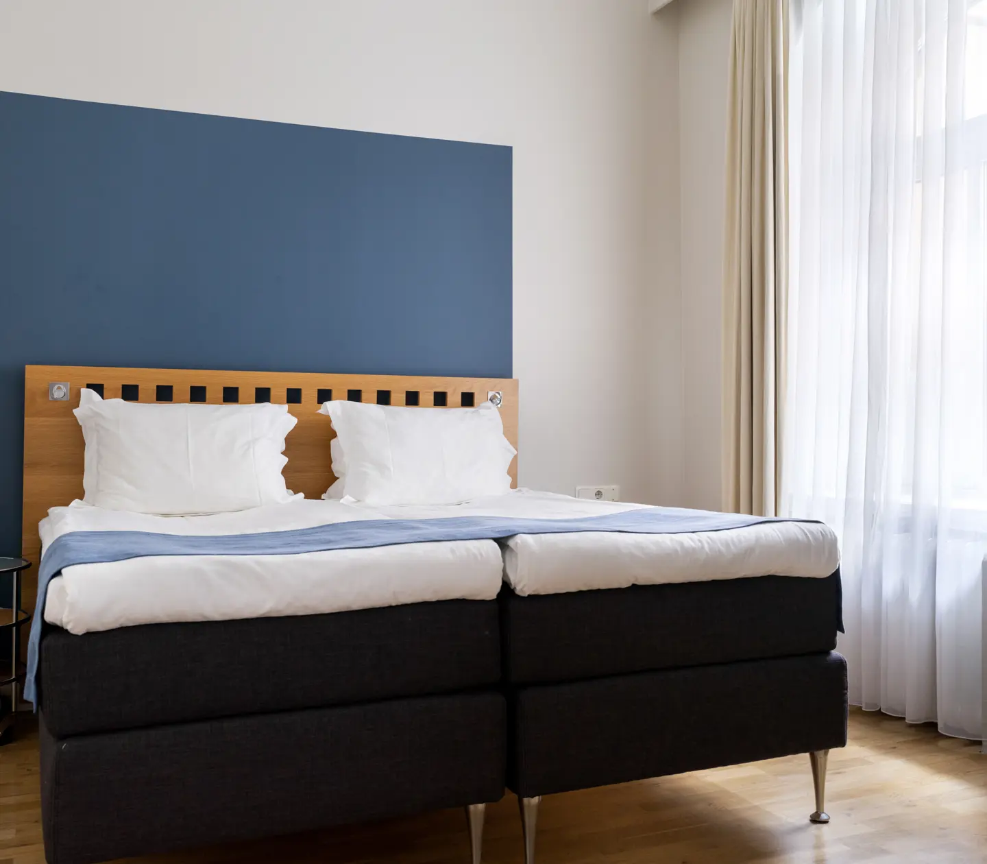 Hotel room with double bed and window