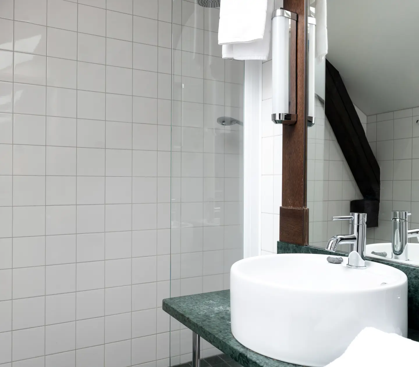 Bathroom with wooden beams, sink and shower