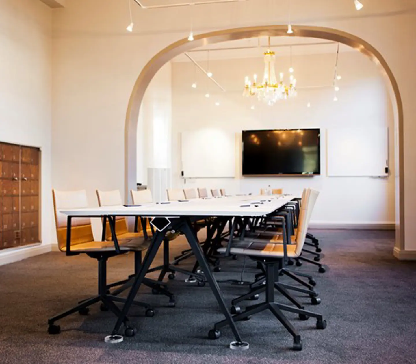Conference room with large table and vault