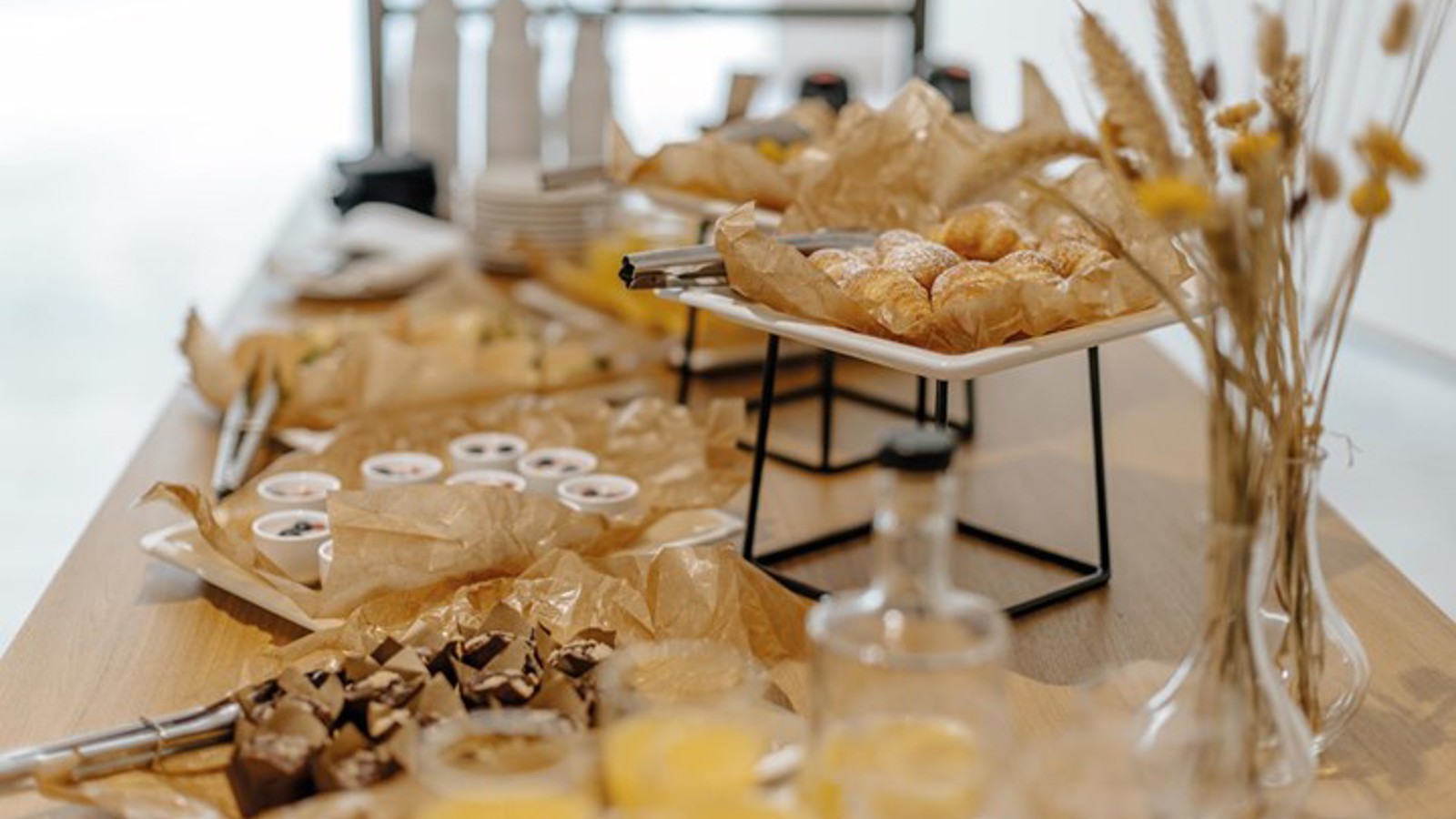 Buffet table with coffee bread and juice