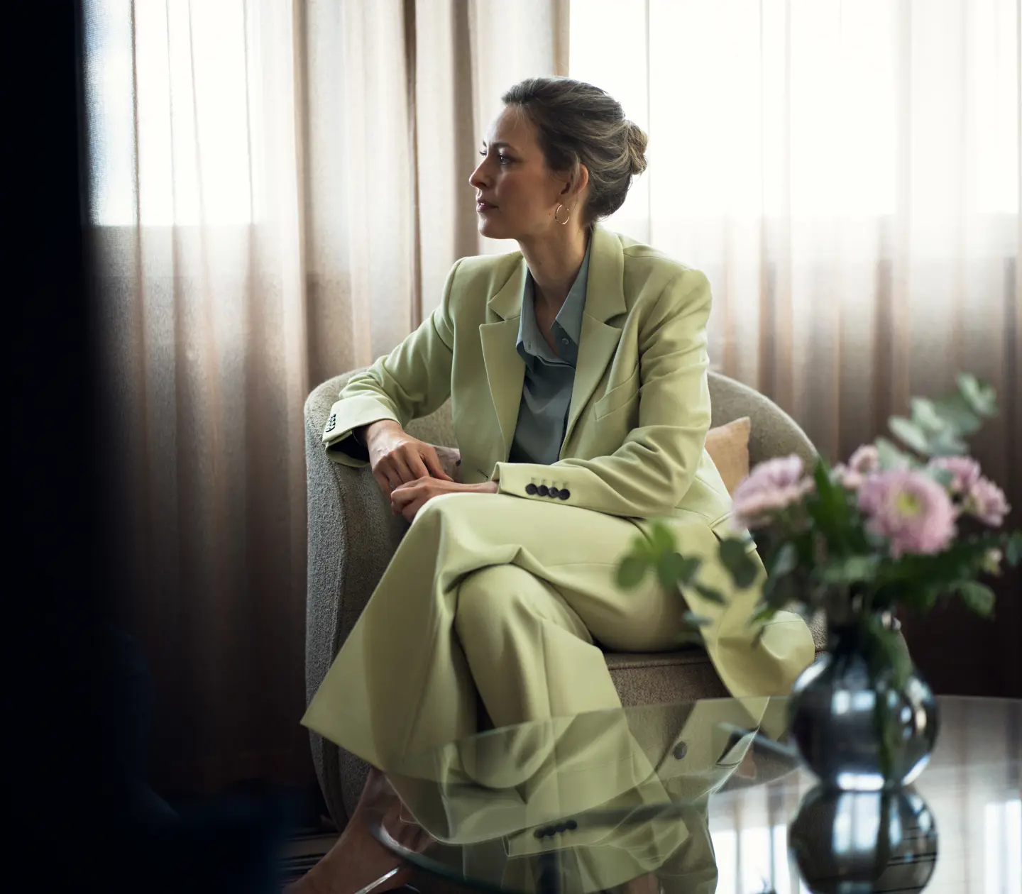 A woman giving a lecture on stage