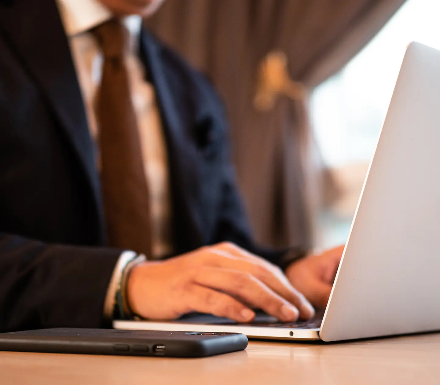 A person at a desk with a computer