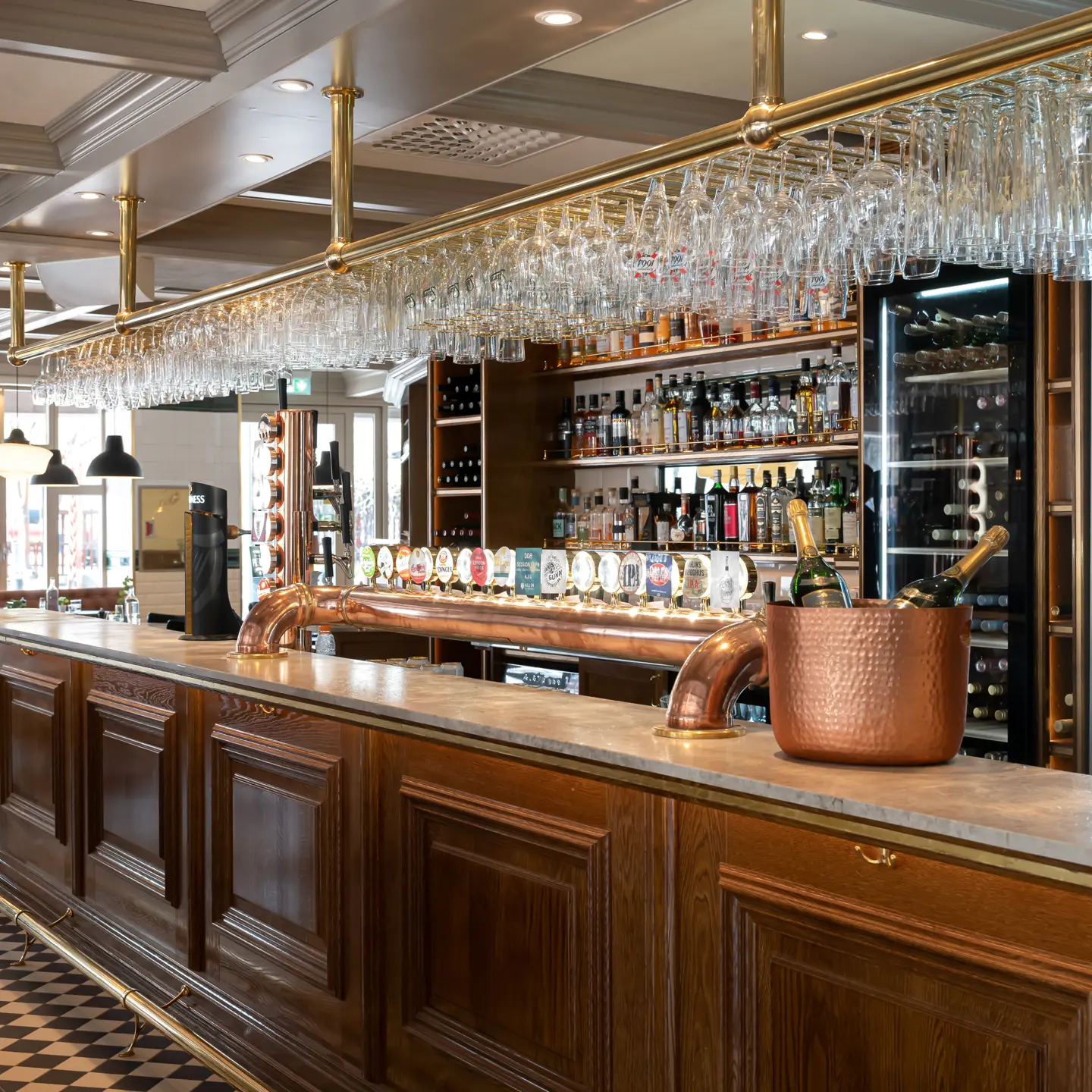 Bar with beer taps and bottles