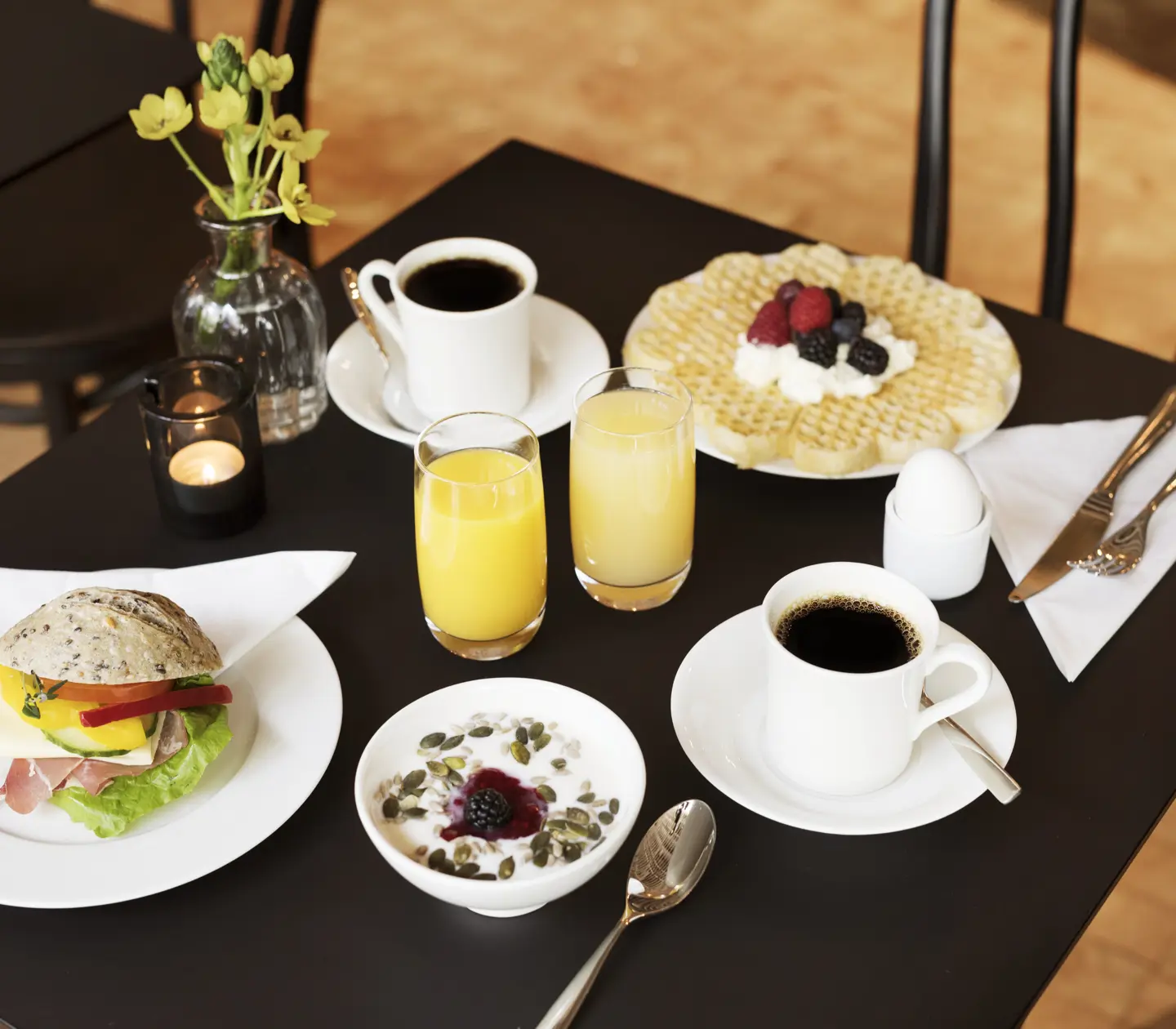 Breakfast served on a black table
